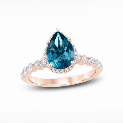 Image of a blue topaz gemstone engagement ring.